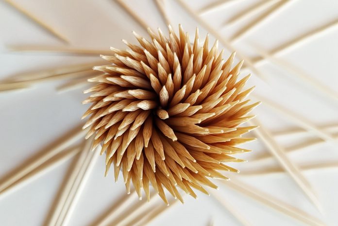 Directly Above Shot Of Toothpicks Over White Background