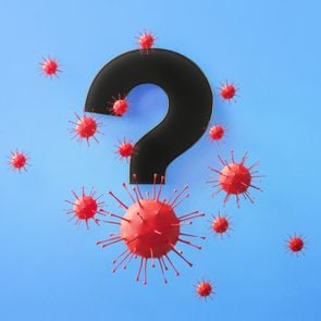 Question Mark Symbol Surrounded by Red Viruses on Blue Background
