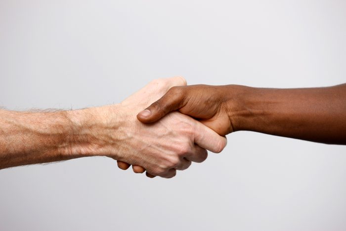 Two People Shaking Hands