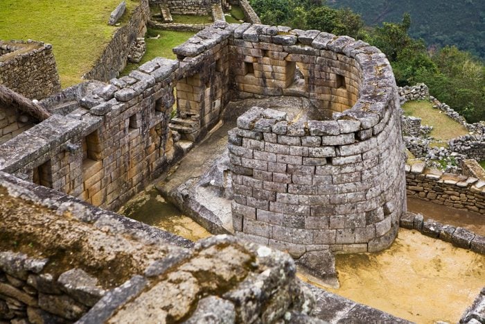 High angle view of the ruins of a temple, Temple of The Sun, Machu Picchu, Urubamba Valley, Cuzco, Peru