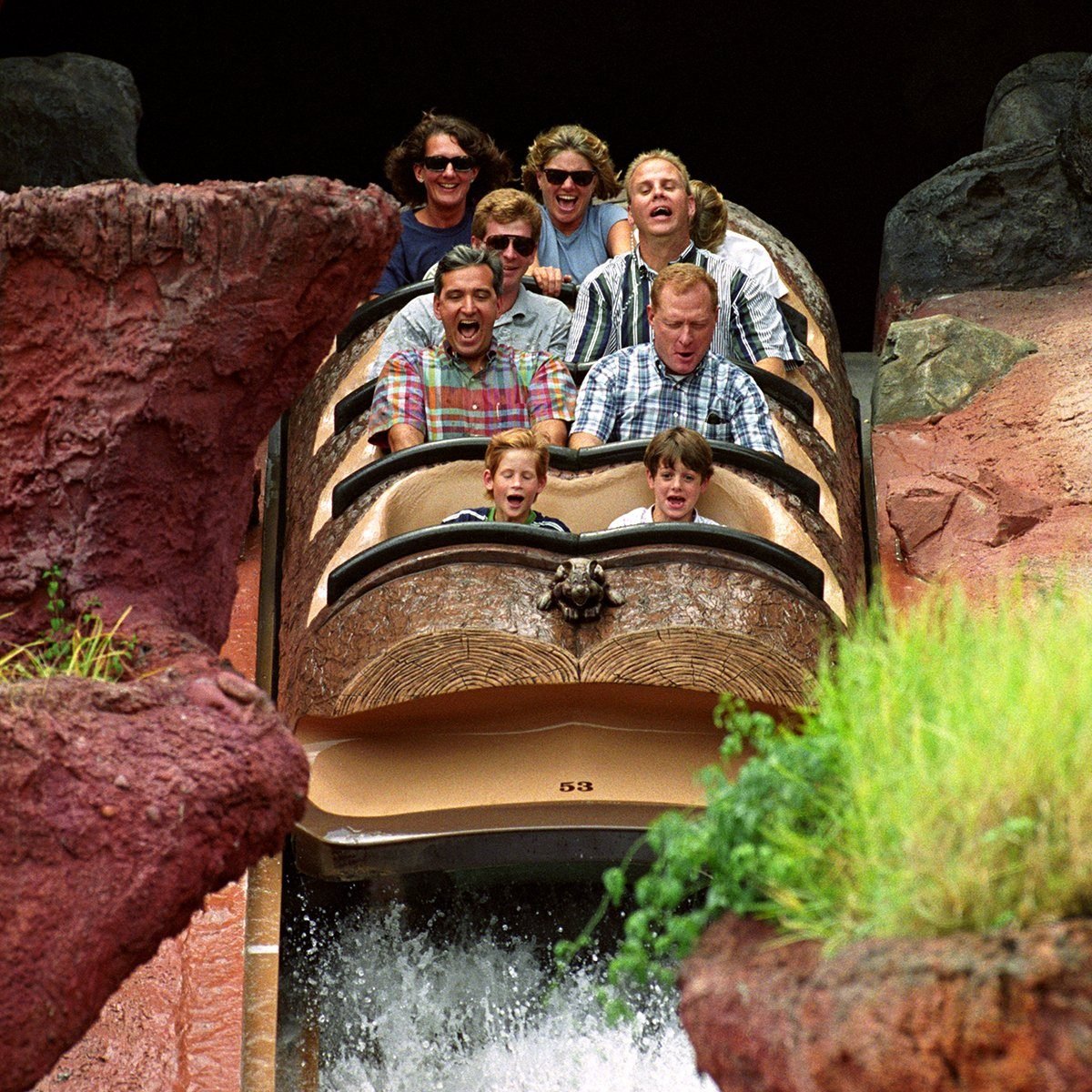 Prince Harry (front left) rides a Log Flume down Splash Mountain at Disney's Magic Kingdom in Florida, USA, leaning forward, hidden (top row right) is his mother the Princess of Wales. (Photo by Martin Keene - PA Images/PA Images via Getty Images)