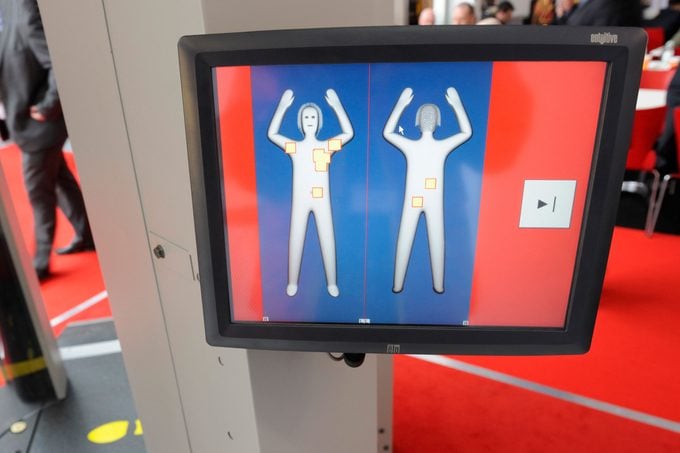 computer screen with a body scan at an airport showing an illustrative and less detailed paper doll human figure
