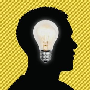 Outline of a man with a lightbulb shining in his head