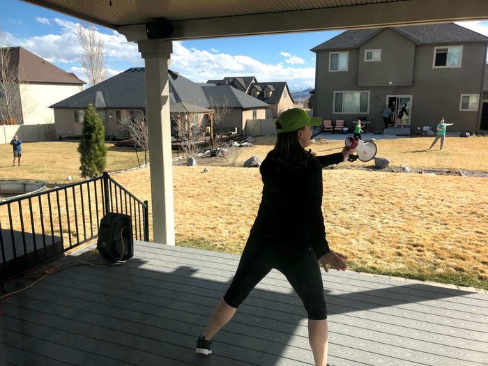 Heather Doney leading a zumba class from her back porch