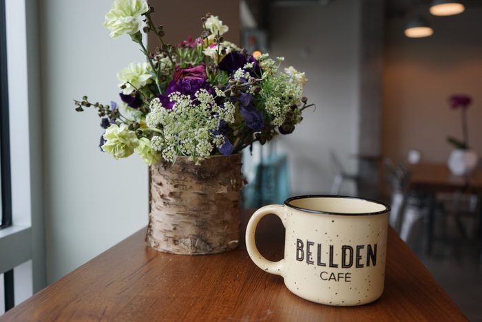 flowers and a mug at Bellden Cafe