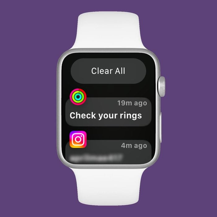 Hidden Apple Watch feature clearing notifications on a purple background