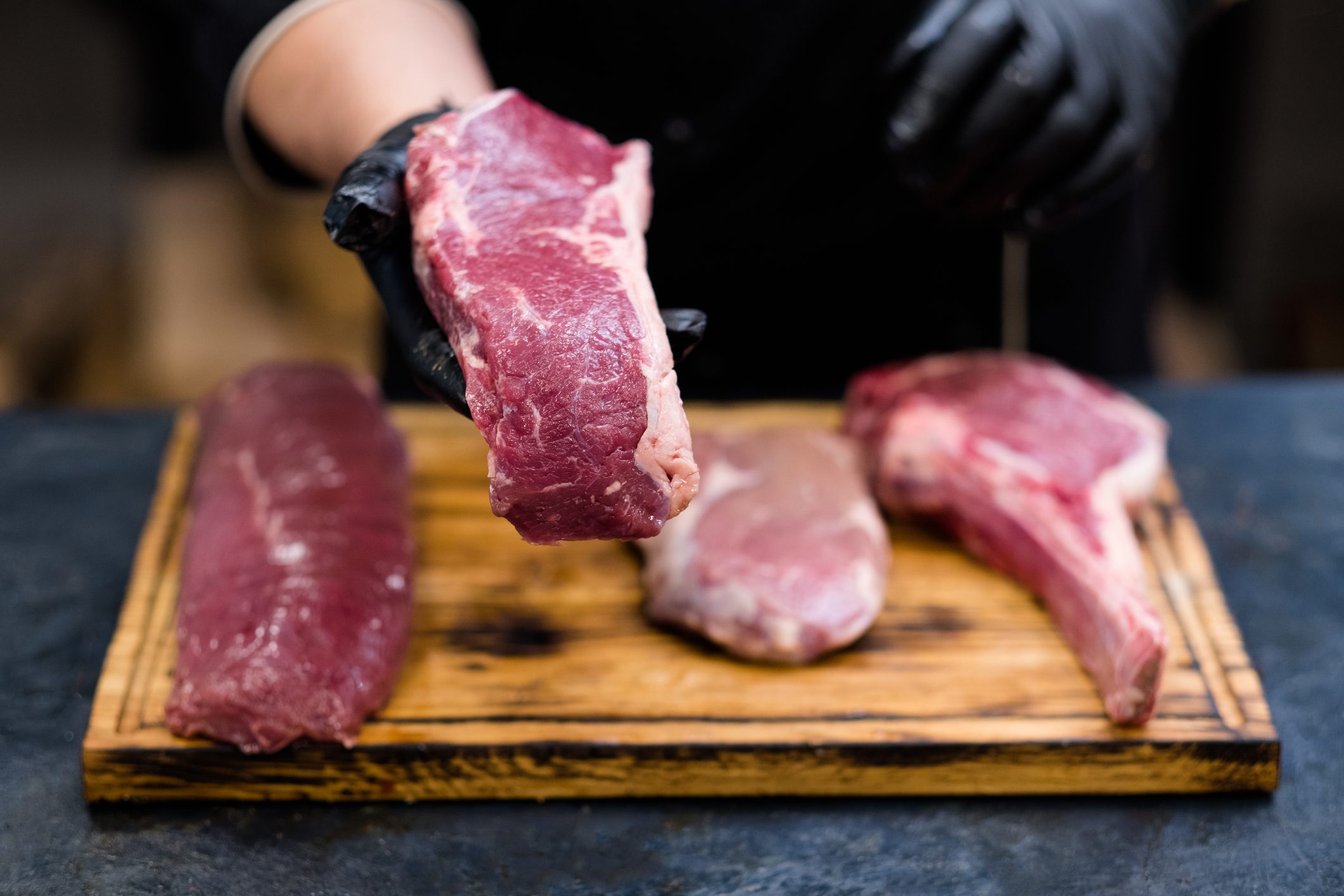 butcher shop fresh cuts raw beef meat chef steaks