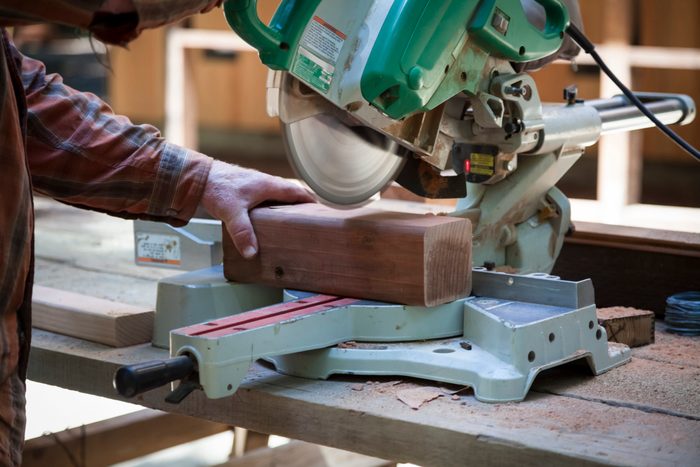 radial arm saw cutting wood
