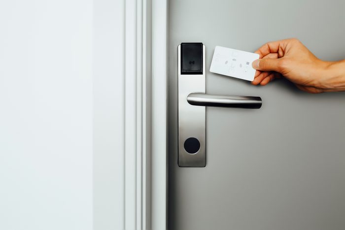 Entering a hotel room with electronic lock and keycard