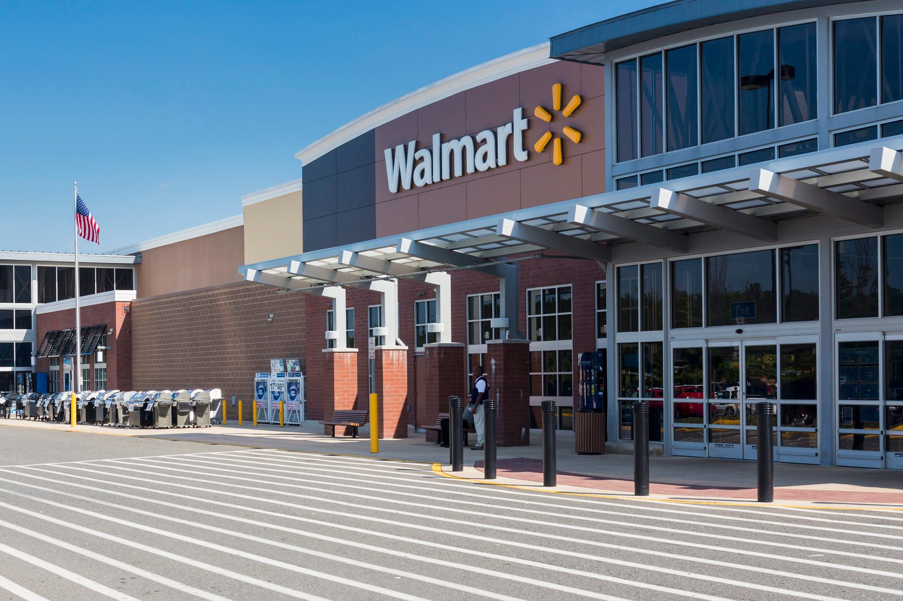 Entrance to large Walmart food supermarket or superstore in Haymarket, Virginia, USA