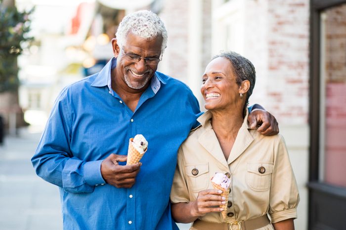 African American Senior Couple On the Town with Ice Cream