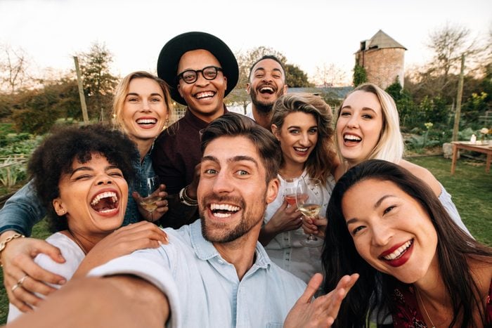 Friends making a selfie together at party
