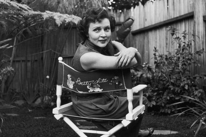 betty white sitting in a director's chair