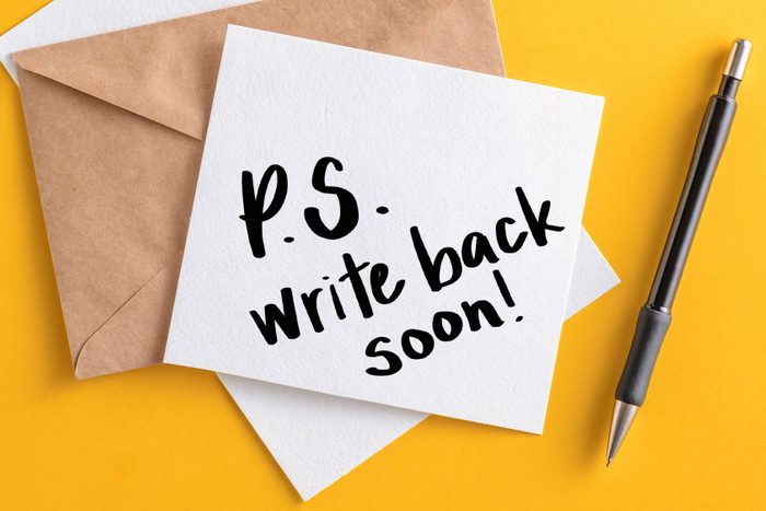 "P.S. write back soon" written on stationary; yellow background
