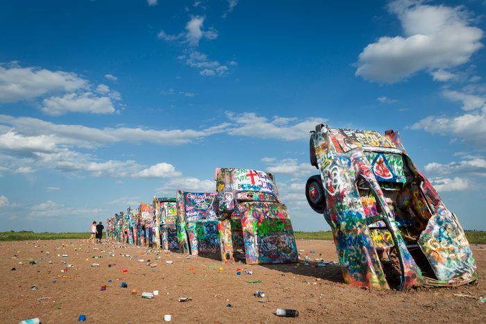 Row of brightly painted Cadillacs in the Cadillac Ranch in Amarillo, Texas, USA.
