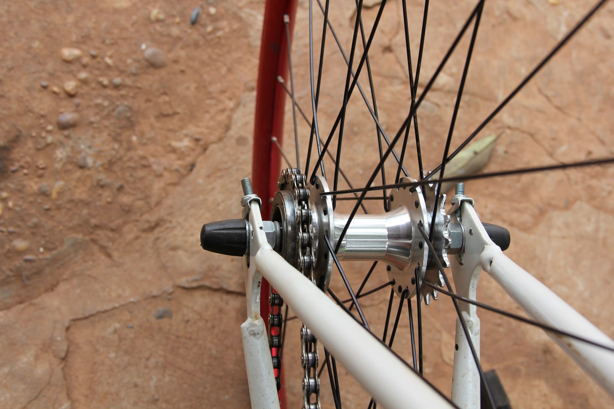 Close-Up Of Bicycle Wheel On Road