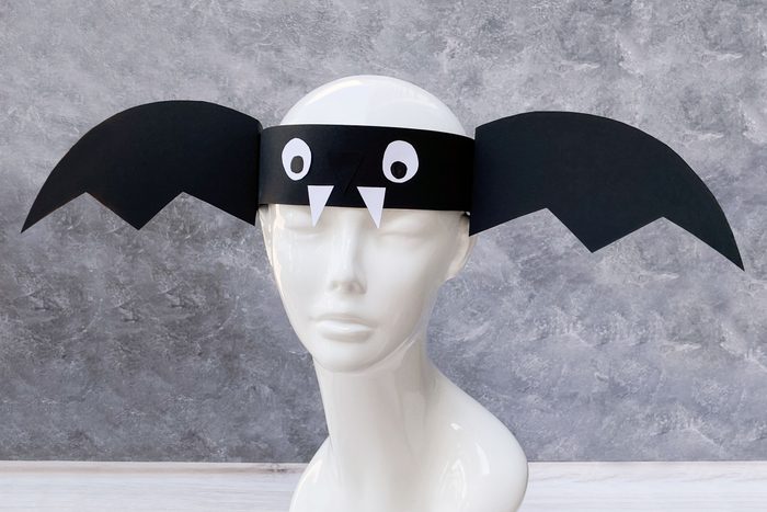 Bat Headband Kids Halloween Craft shown on plastic bust