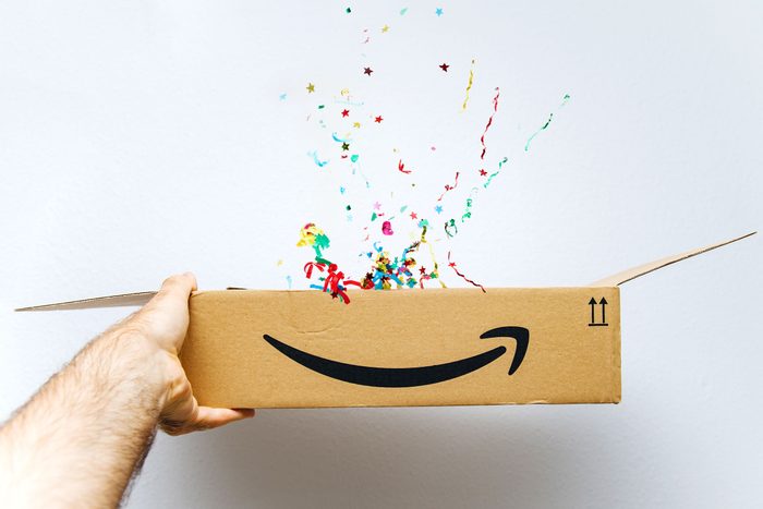 confetti popping out of an amazon box