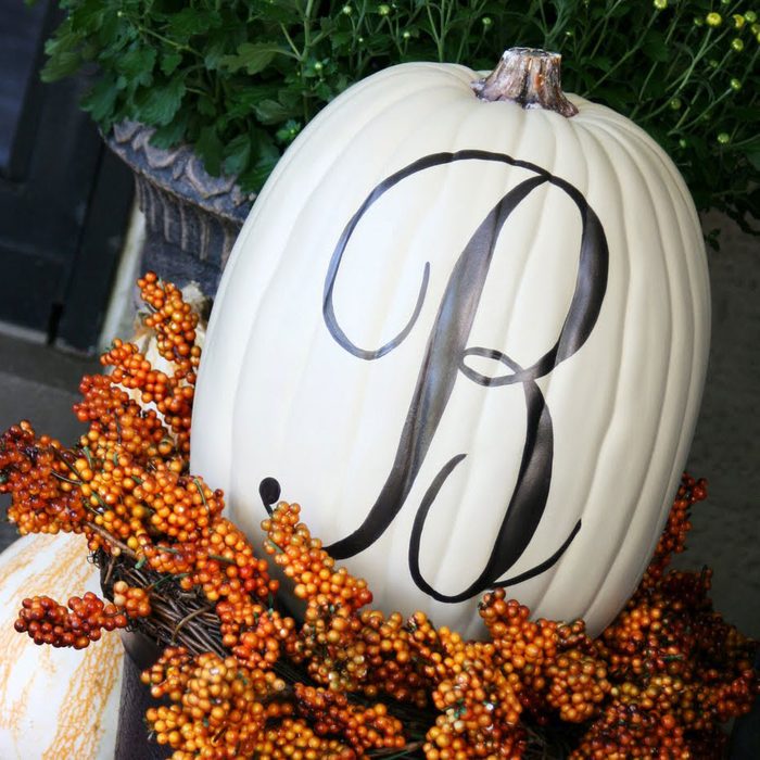 pumpkin painted with a monogram design
