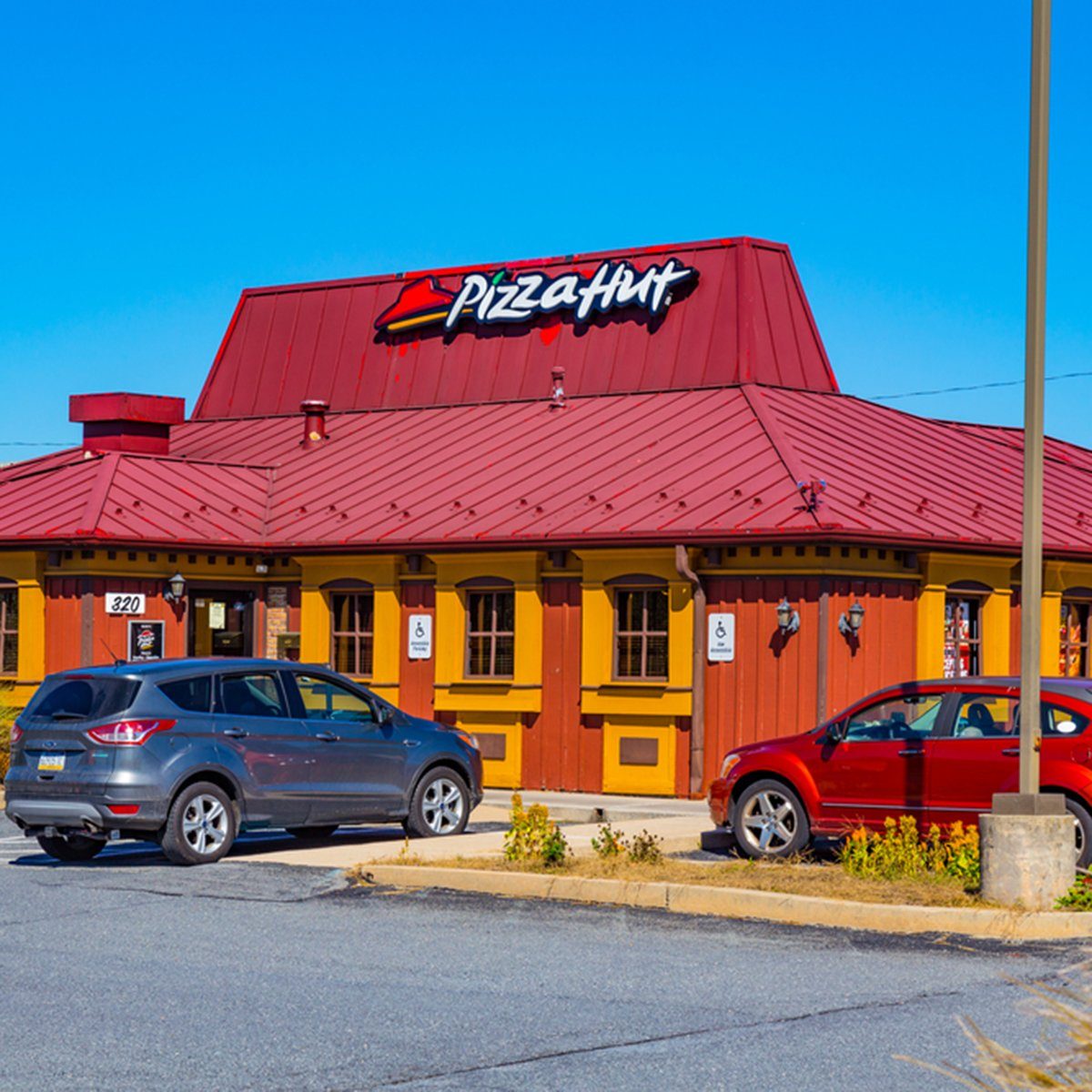 A Pizza Hut restaurant offers fresh pizzas to eat in the restaurant as well as to carryout at one of the chain's restaurants.