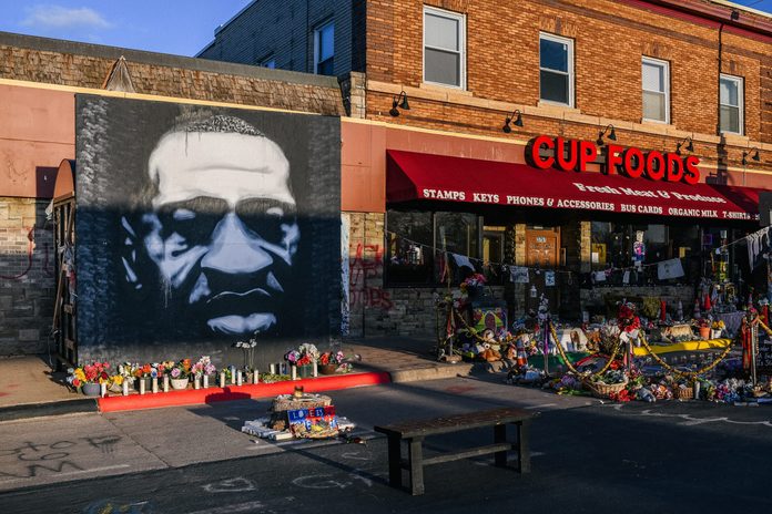 A mural of George Floyd is shown next to Cup Foods on March 31, 2021 in Minneapolis, Minnesota.