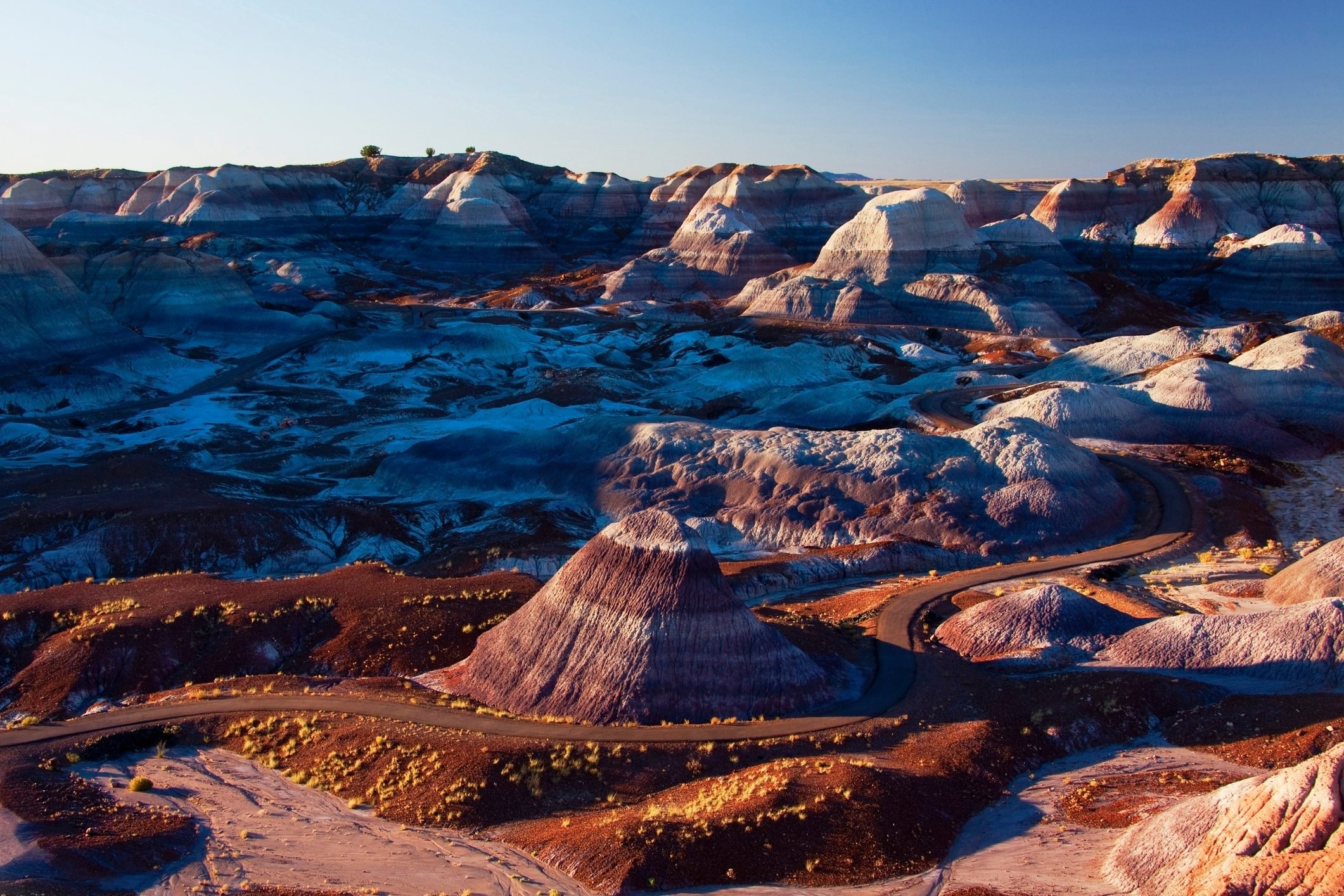 Multicolor rock formations in mountainous remote landscape, Petrified Forest National Park, Arizona, United States