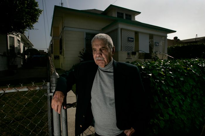 (Los Angeles)World War ll hero Guy Gabaldon stands in front of the house in Boyle Heights where he