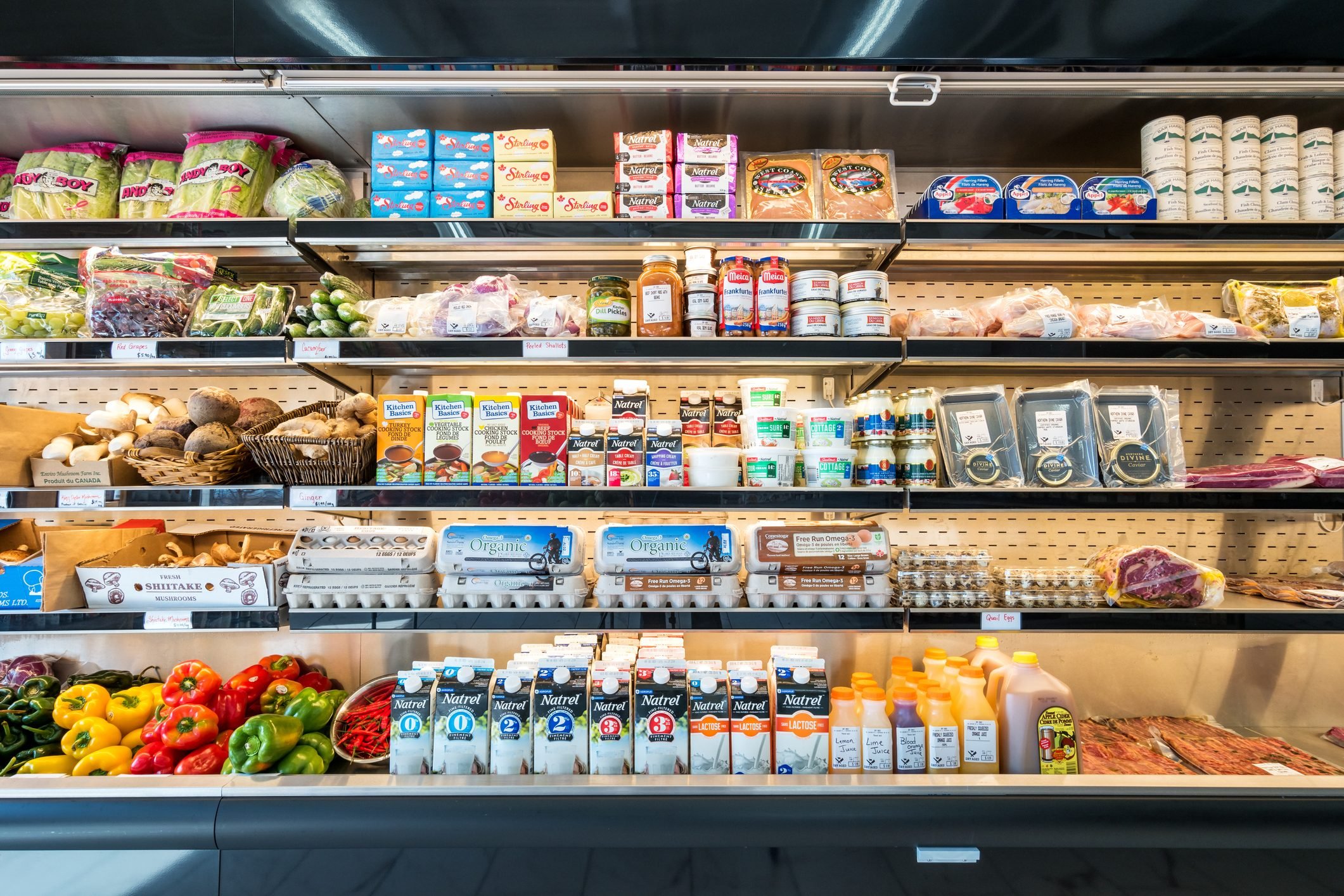 Refrigerator shelves in a grocery delicatessen store