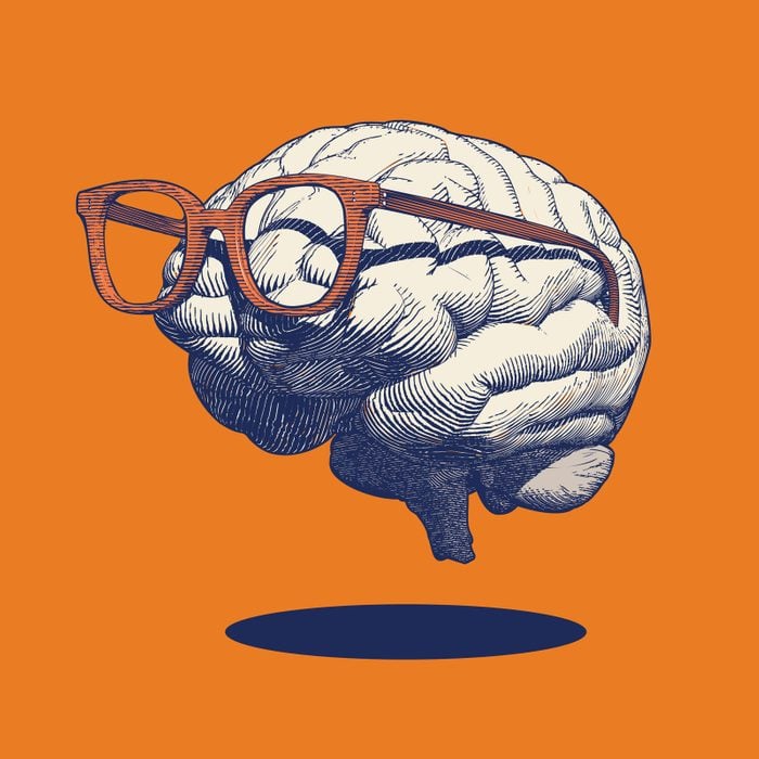 an illustrated brain wearing glasses with an orange background
