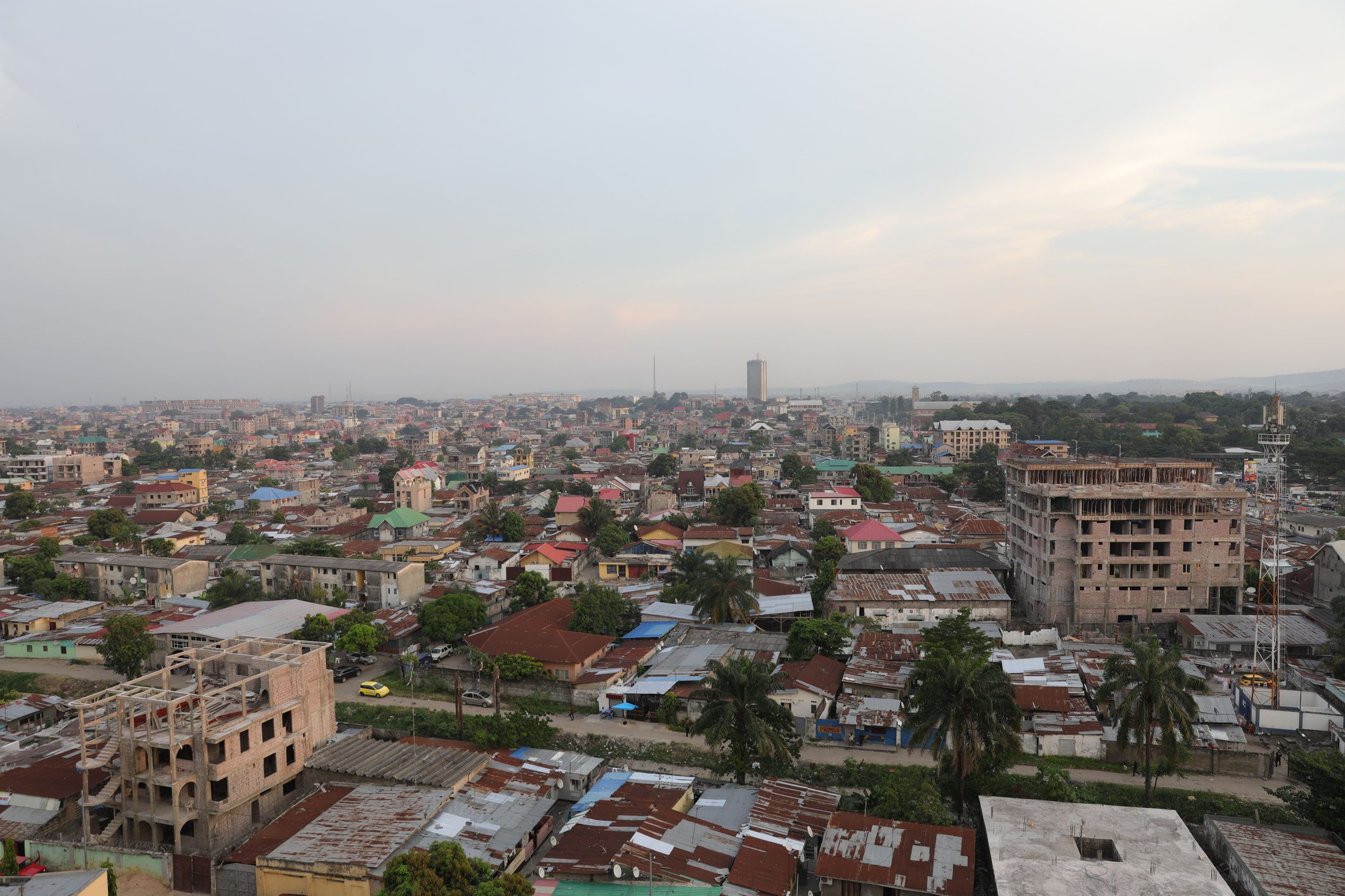 High Angle View Of Townscape Against Sky During Sunset