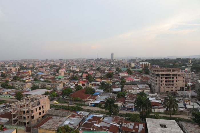 High Angle View Of Townscape Against Sky During Sunset