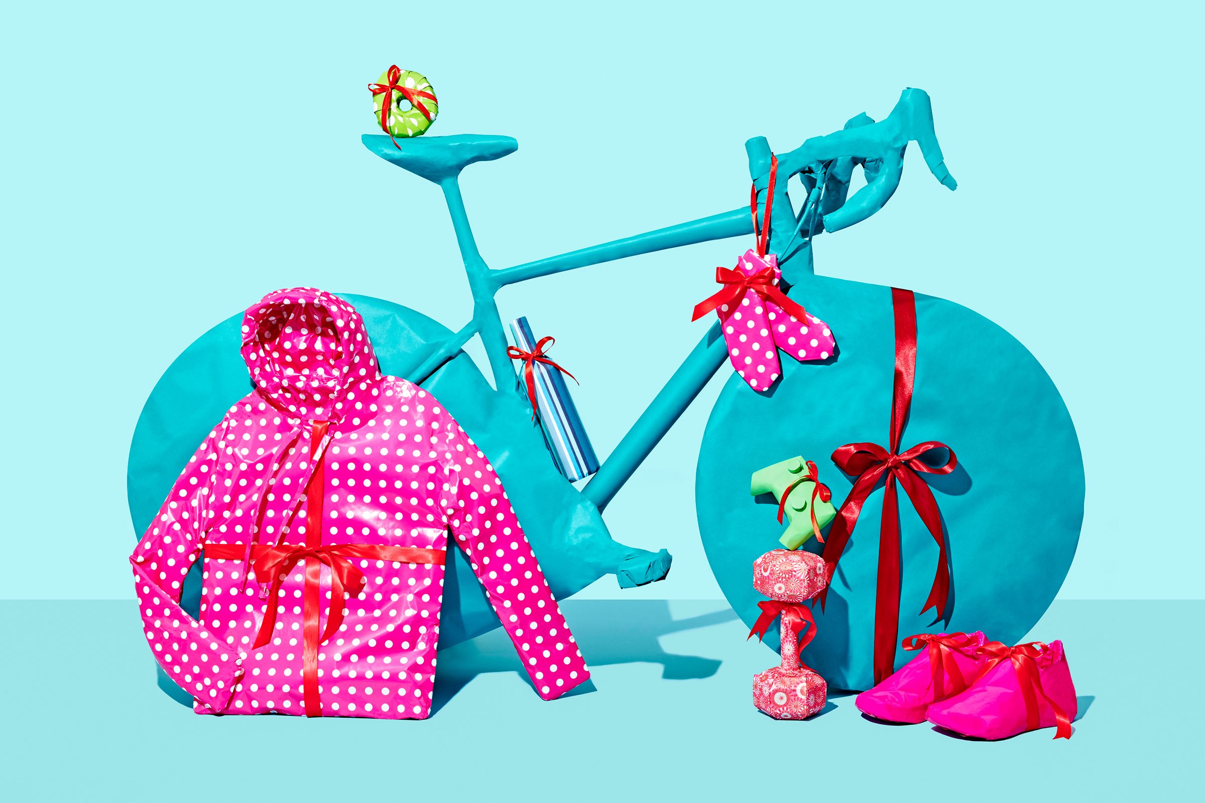 holiday gifs wrapped: bike, bagel, wine bottle, hoodie, hand weights, sneakers