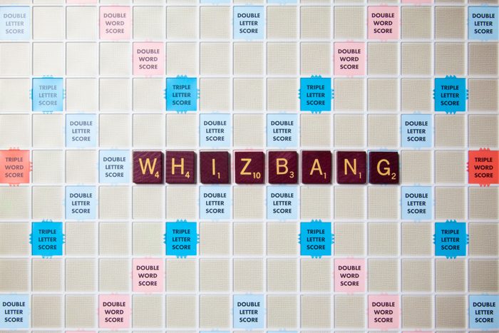scrabble board with tiles that spell out whizbang