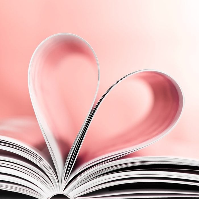 Love to reading books, pages folded into red heart shape