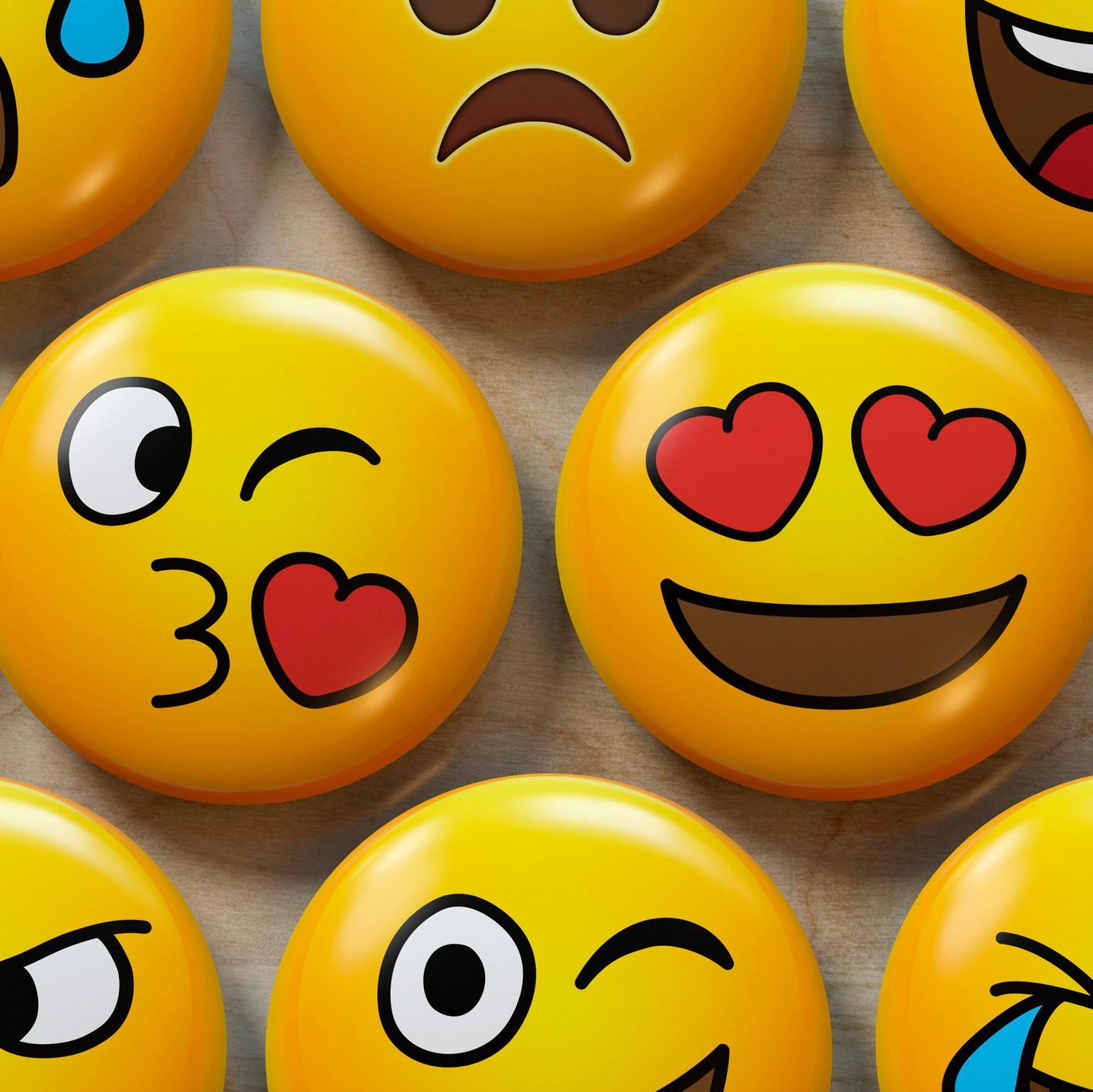 Two emoji badges in love