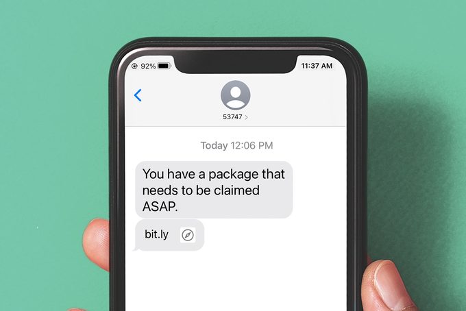 iPhone with screen displaying fake, scam text messages