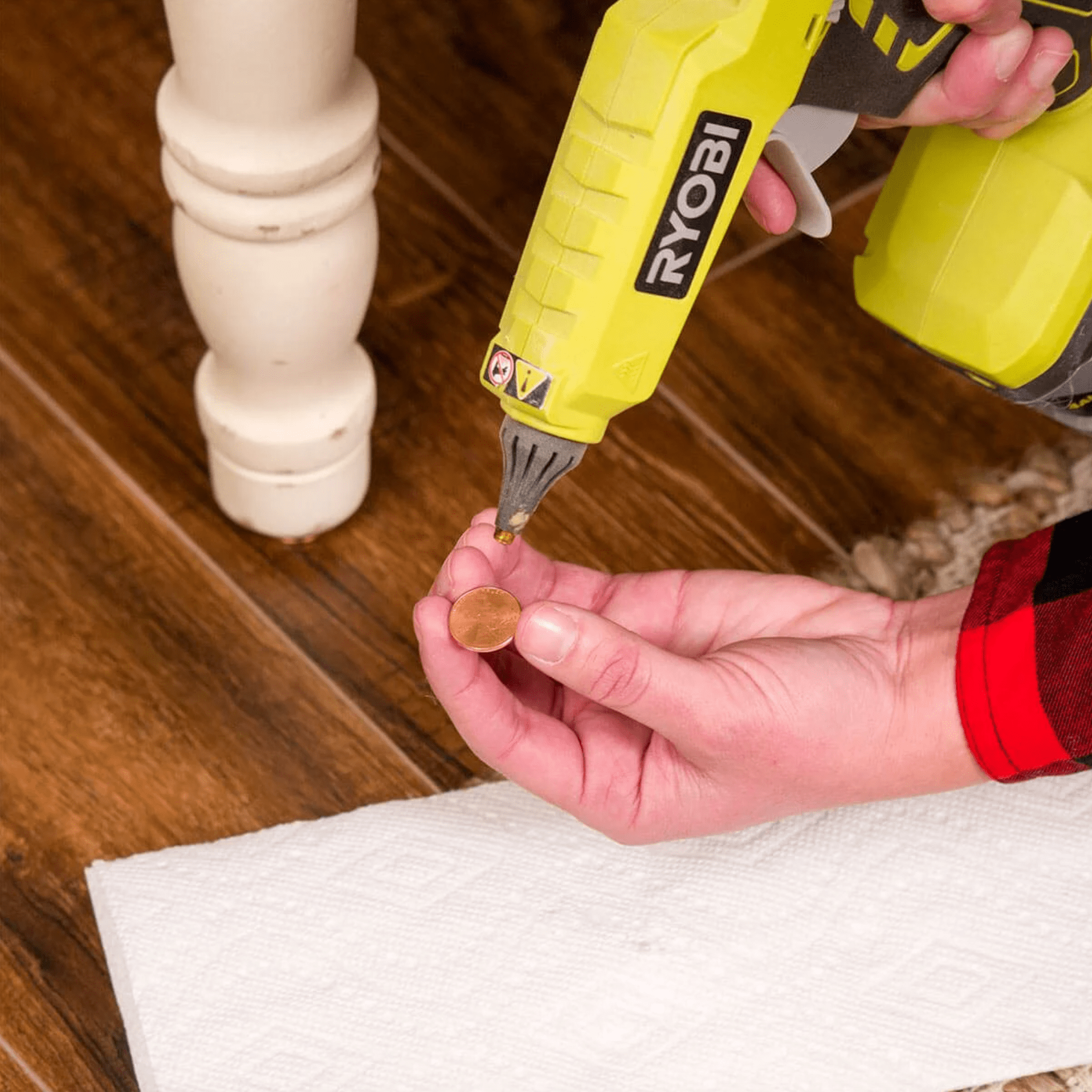 Hot Glue Gun Uses: Fix Wobbly Furniture with a Penny