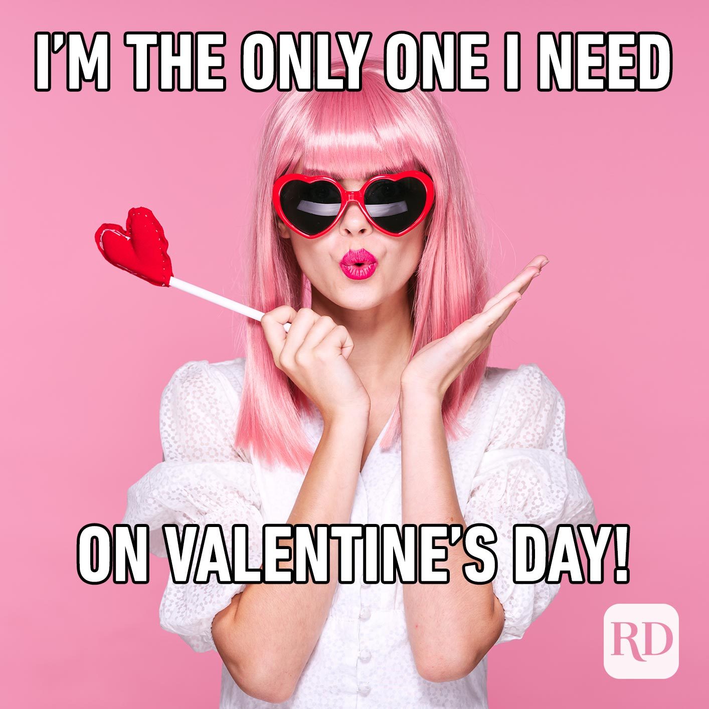 Woman in pink wig with heart-shaped sunglasses. Meme text: I'm the only one I need on Valentine's day.