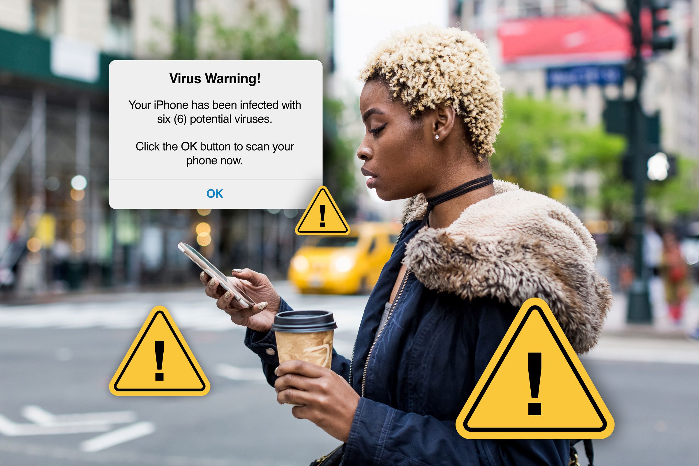 Woman on Smartphone receiving a scam alert that her phone might have a virus