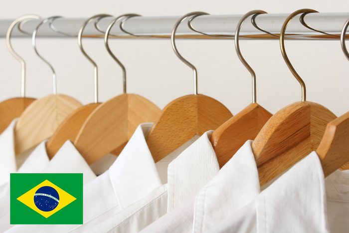 white shirts hanging with brazil flag
