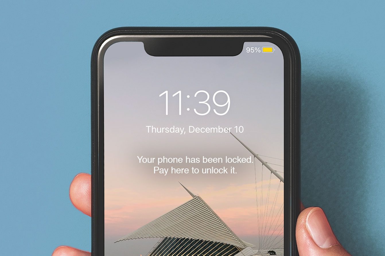 Locked iPhone reading: Your phone has been locked. Pay here to unlock it.