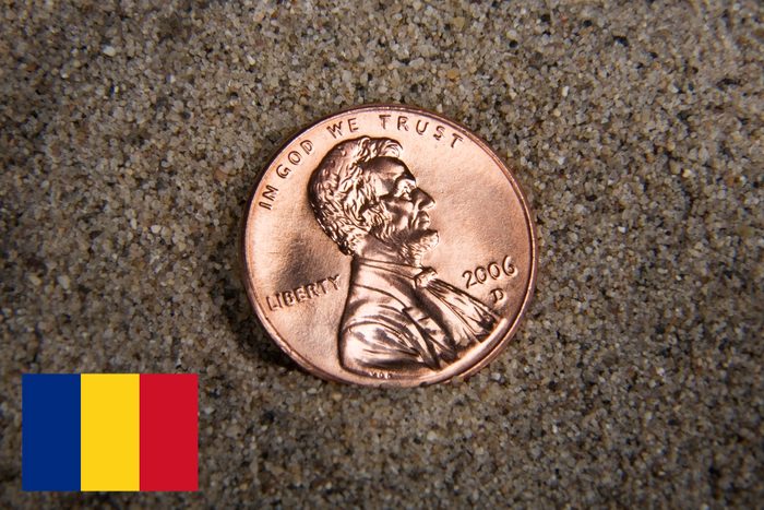 penny coin with romania flag