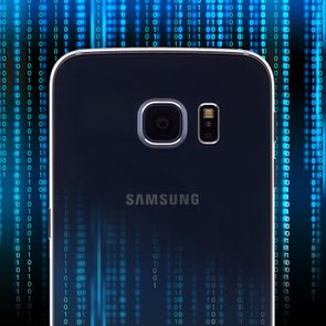 Android phone on background of dark code, to represent malware