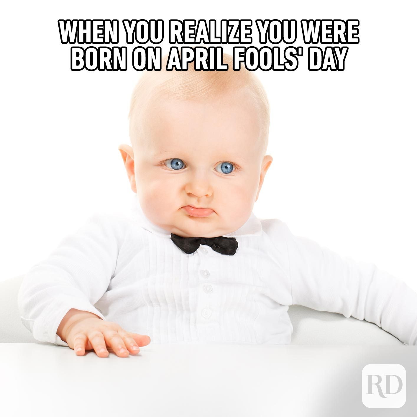 Skeptical baby. Meme text: When you realize you were born on April Fools' Day
