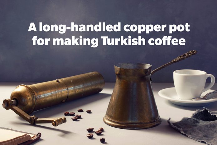 A long-handled copper pot for making Turkish coffee