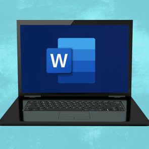 A laptop showing Microsoft Word icon
