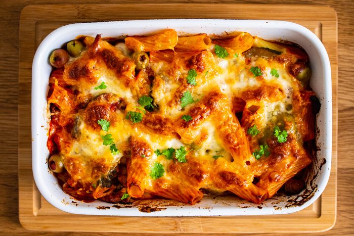 Pasta casserole with barbecue chicken breast, cheese and vegetables
