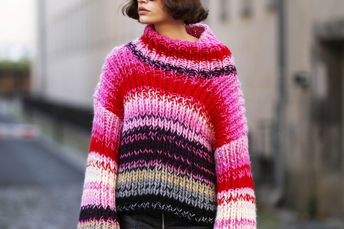 woman wearing oversized knitted sweater