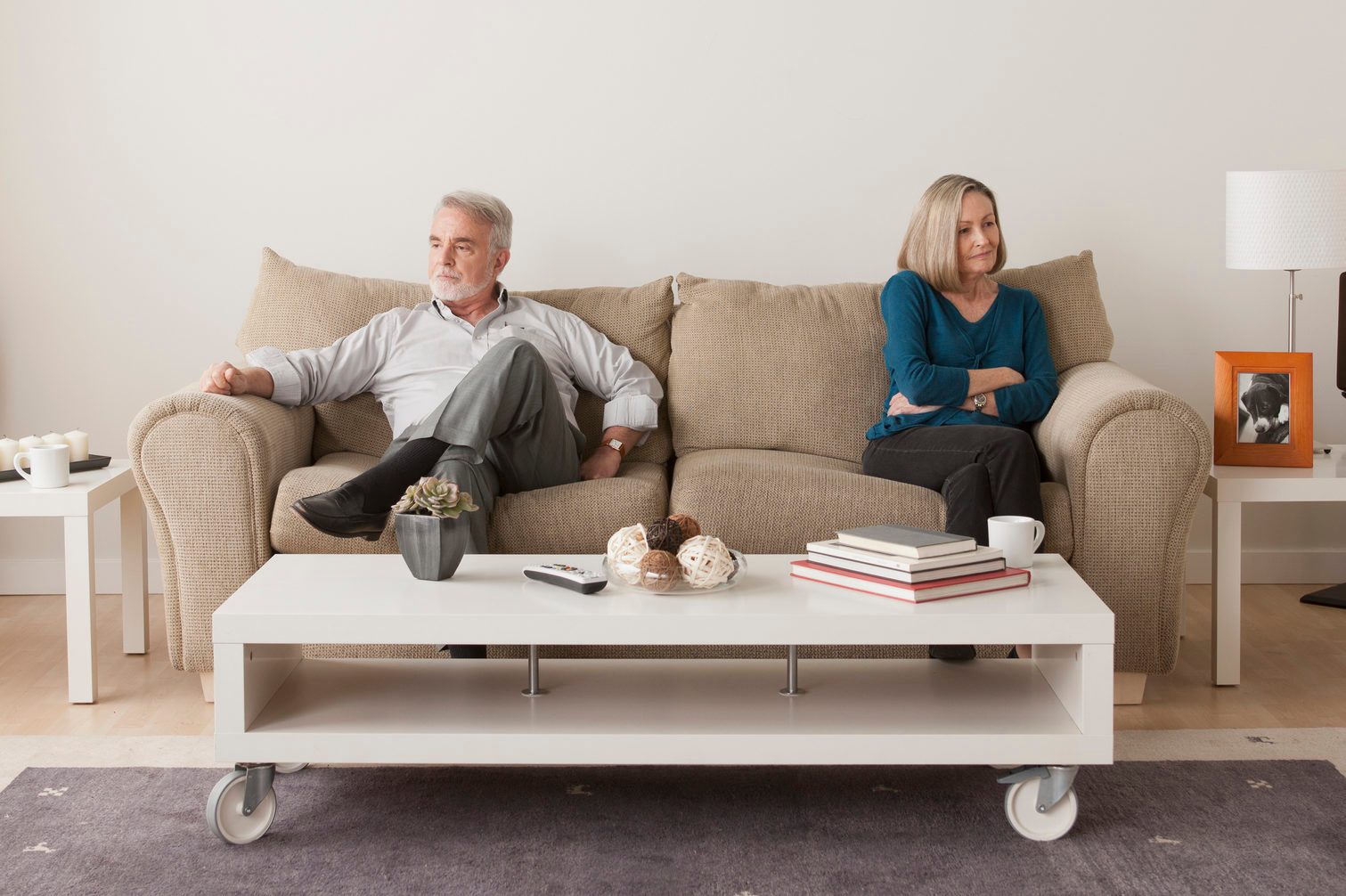 USA, California, Los Angeles, Angry senior couple sitting on sofa