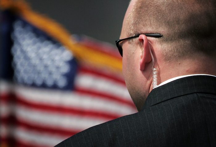 close up of secret service agent from behind
